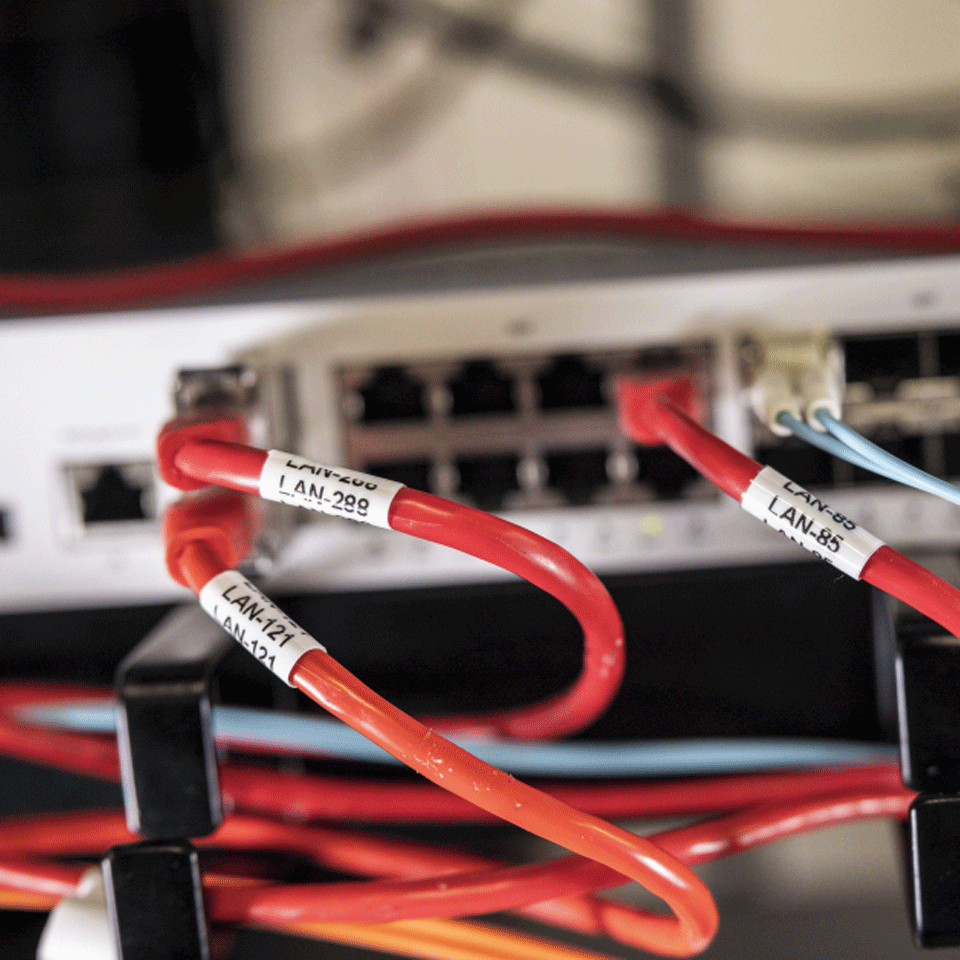 network LAN cables clearly identified with unique cable numbers using Brother flexible ID tape 