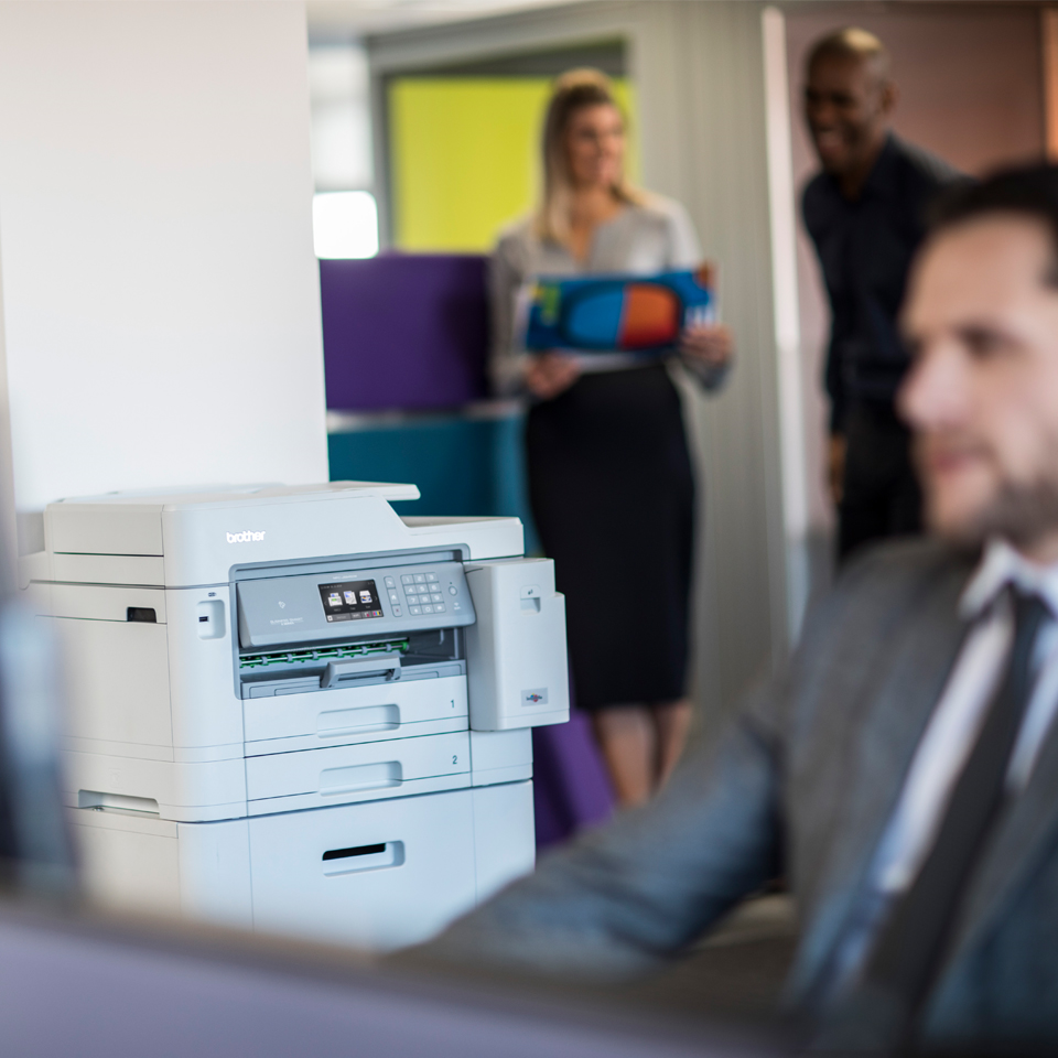 printer on cabinet in office environment