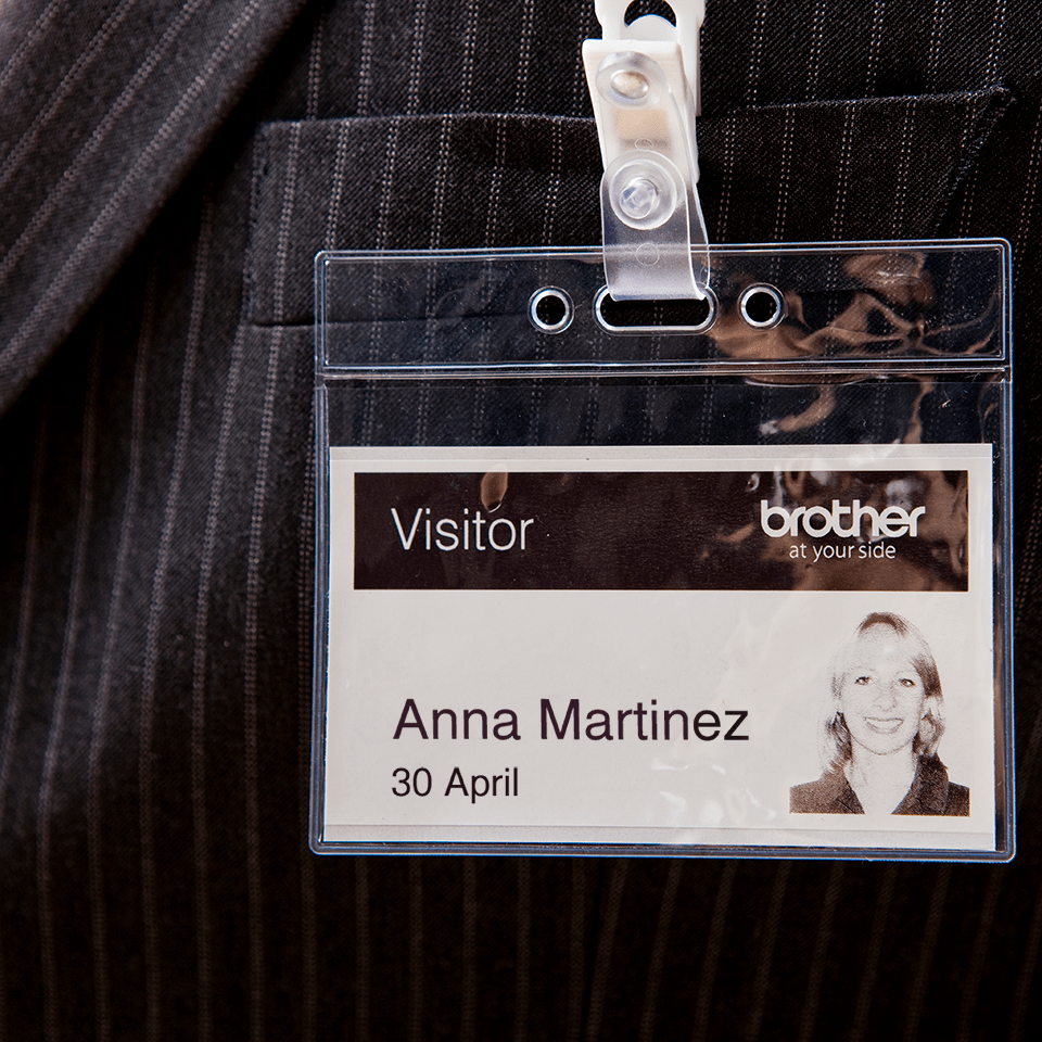 Visitor badge printed on Brother QL-600R label printer using black on white DK continuous label