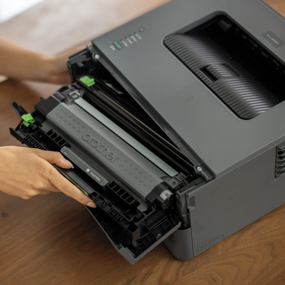 TN2590XL toner being inserted into Brother device