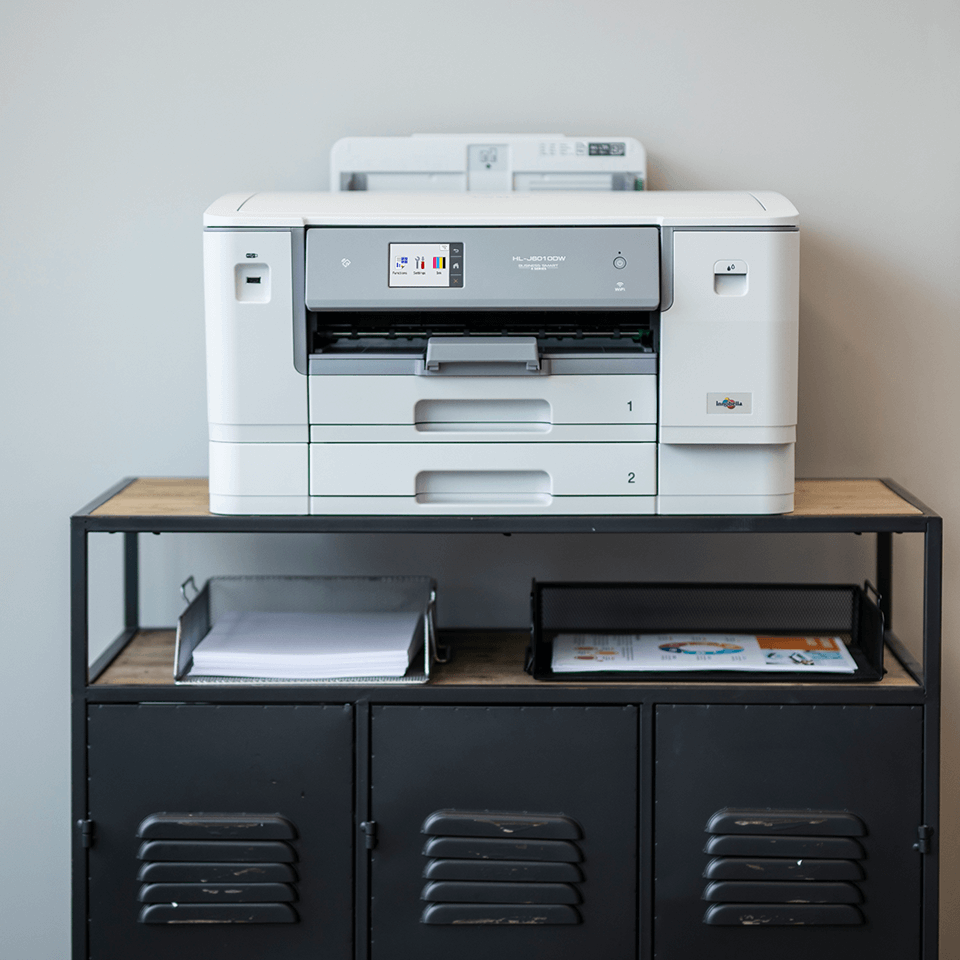 Business printer in office on cabinet