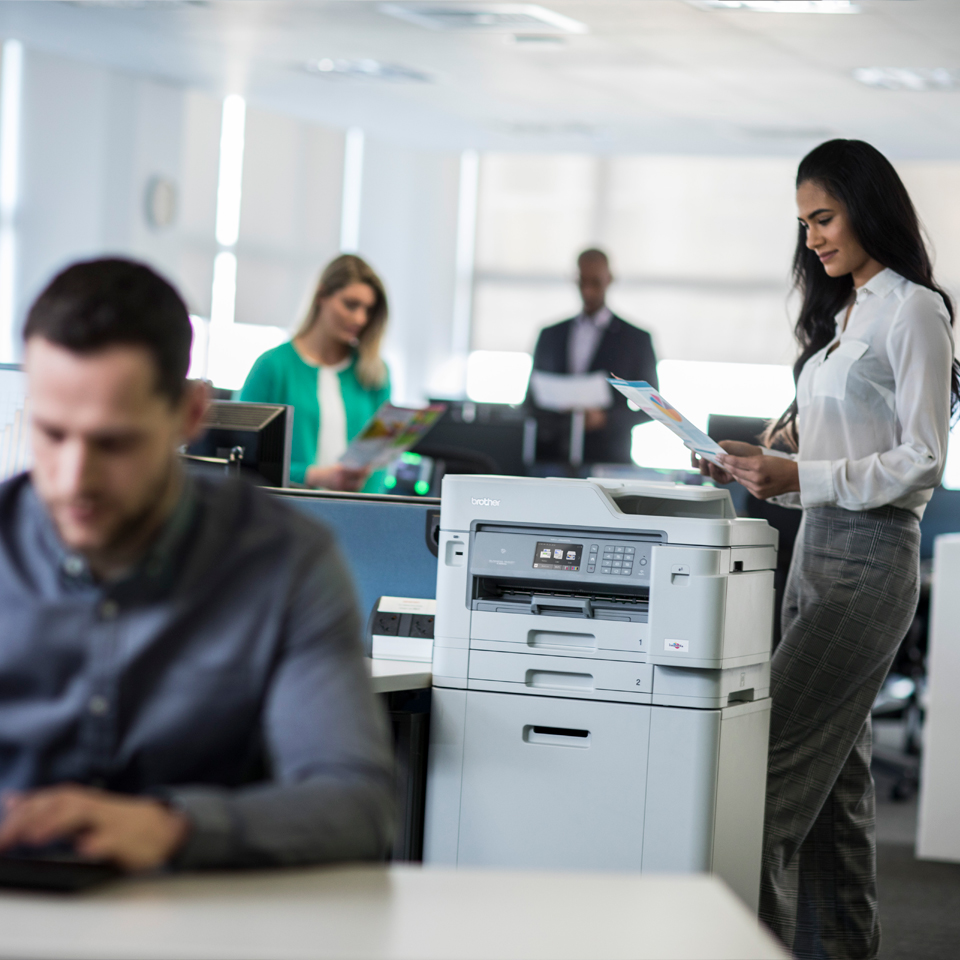 printer on cabinet in office environment