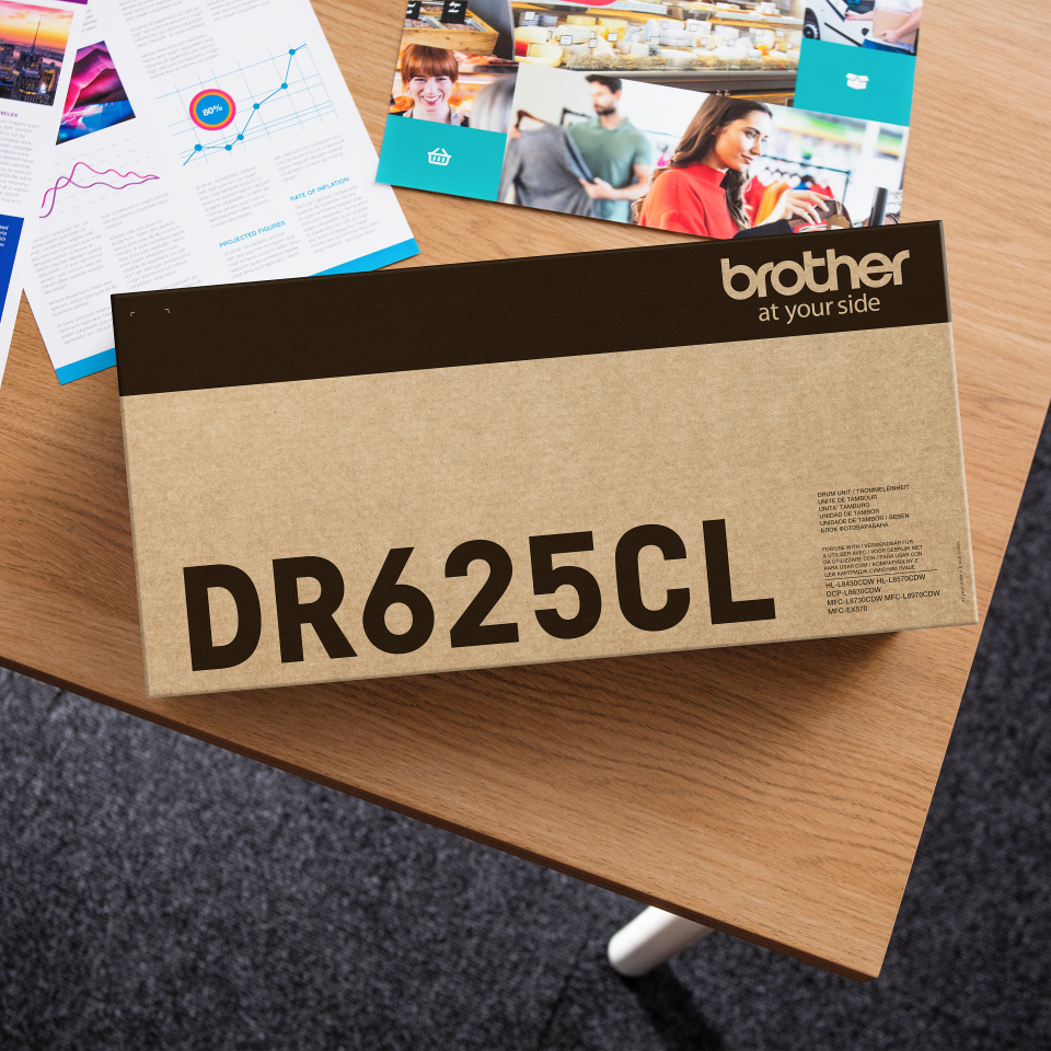 <p>Brother DR625CL laser printer drum unit carton on a desk</p>