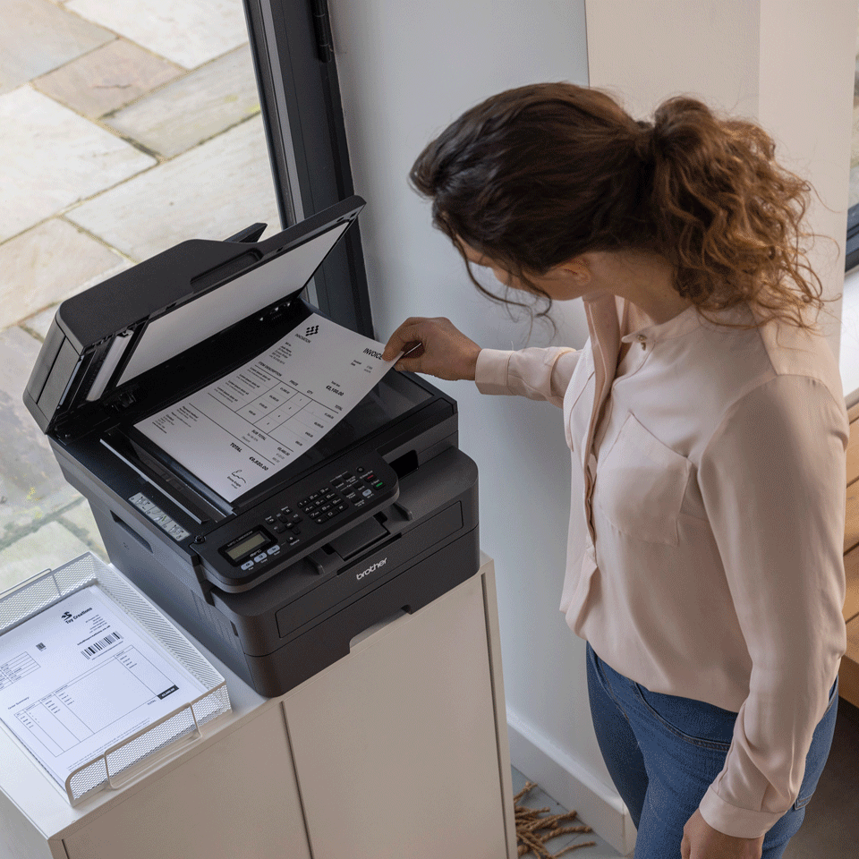 MFC-L2827DW female using printer to copy