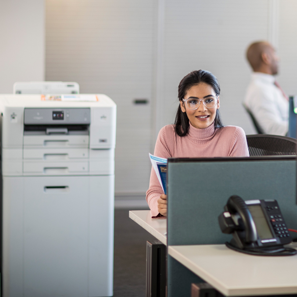 printer on cabinet in office environment