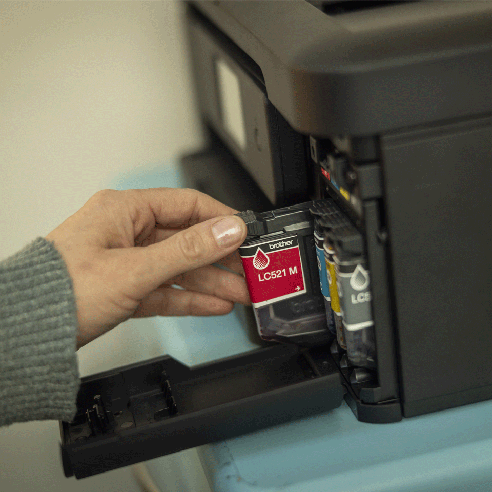 <p>Installing inks into the DCPJ1460DW</p>