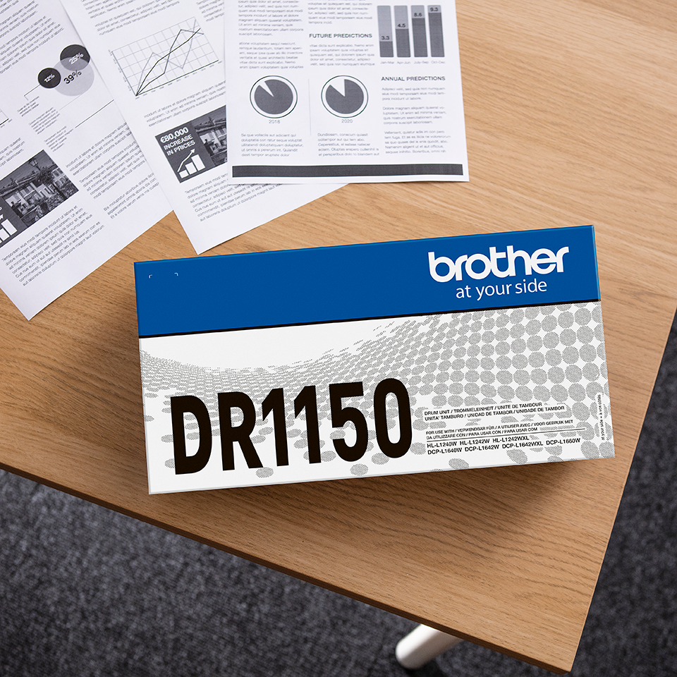 <p>DR1150 laser printer drum carton on a desk</p>