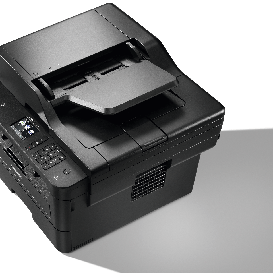 Compact 4-in-1 mono laser printer from above with shadow