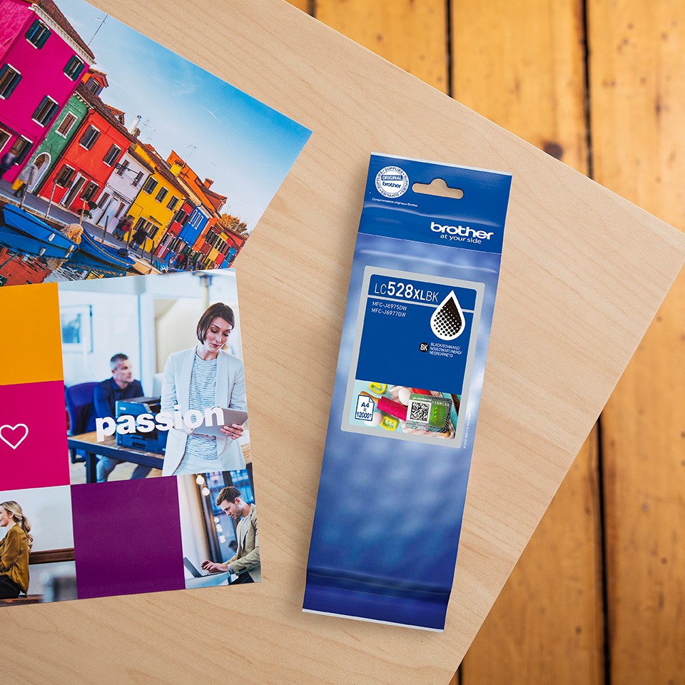 <p>Black high yield LC528XLBK ink cartridge packaging on a desktop</p>