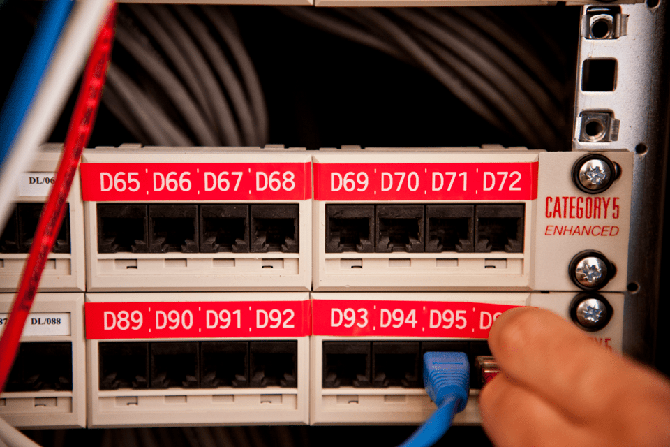 Brother TZe-435 label tape cassette - white on red - network ports on a rack identified with their correct number