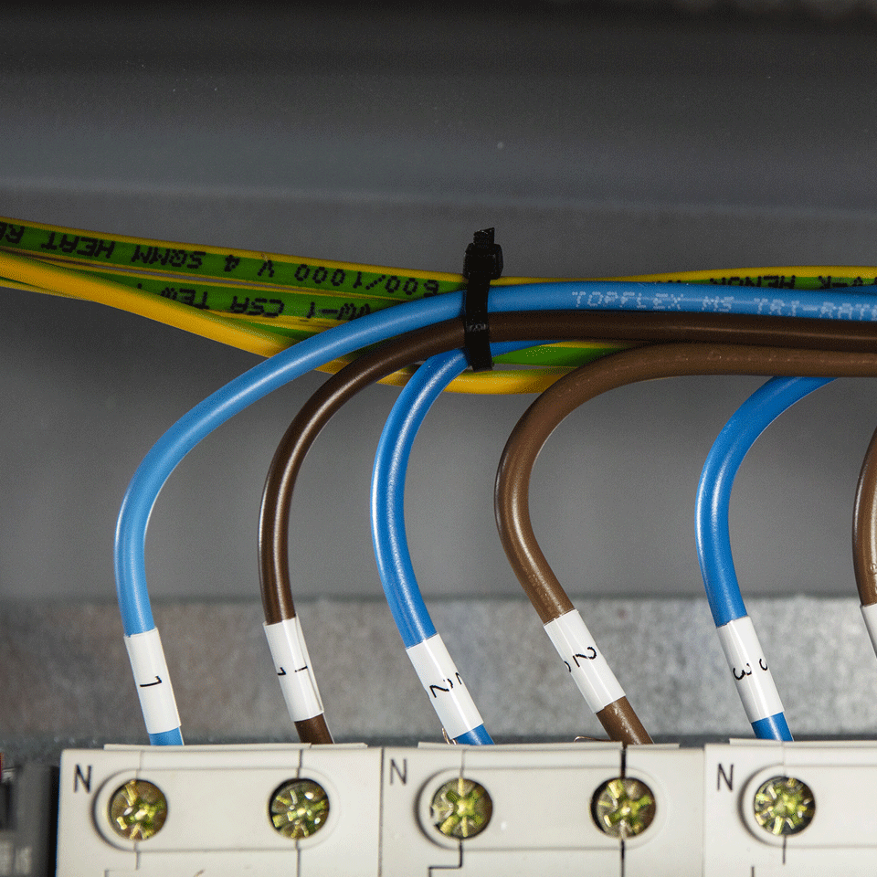 electrical wiring clearly identified with cable wraps using Brother flexible ID tape 