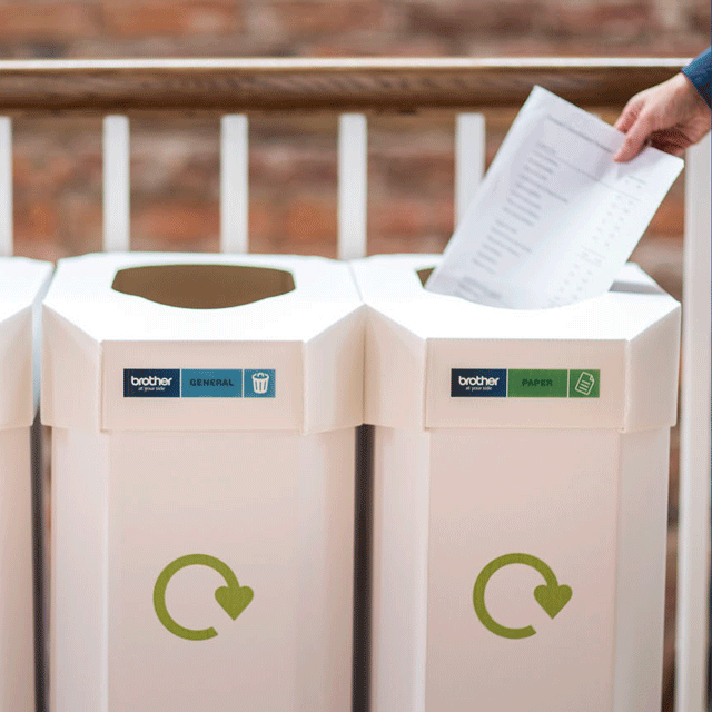 Various recycling bins identified with a Brother label (using 25mm CZ-1004 full colour label roll)