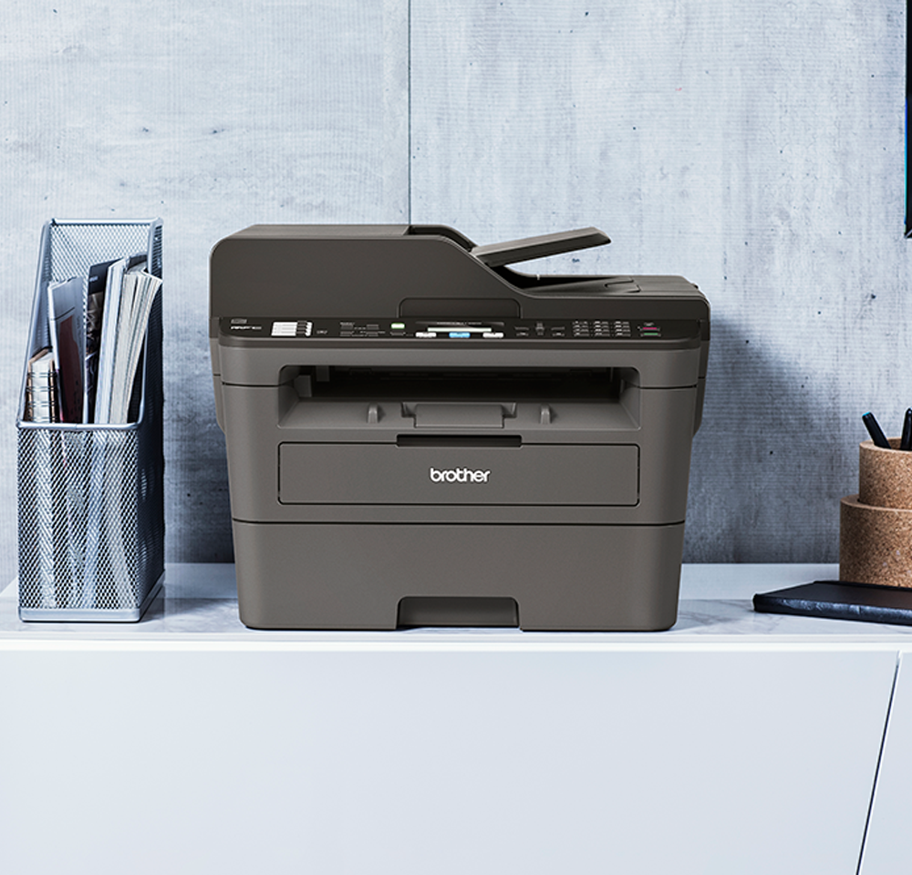 Compact 4-in-1 mono laser printer close up of buttons
