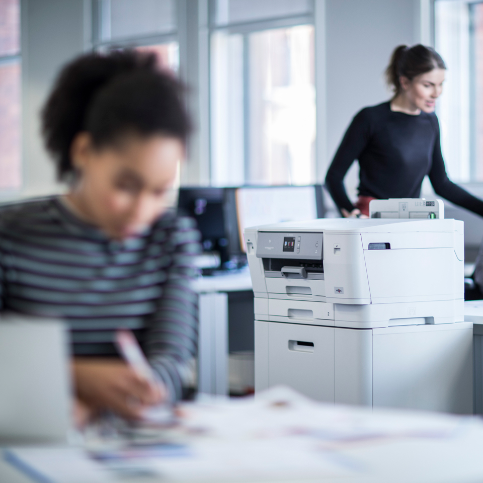 printer on cabinet in office environment