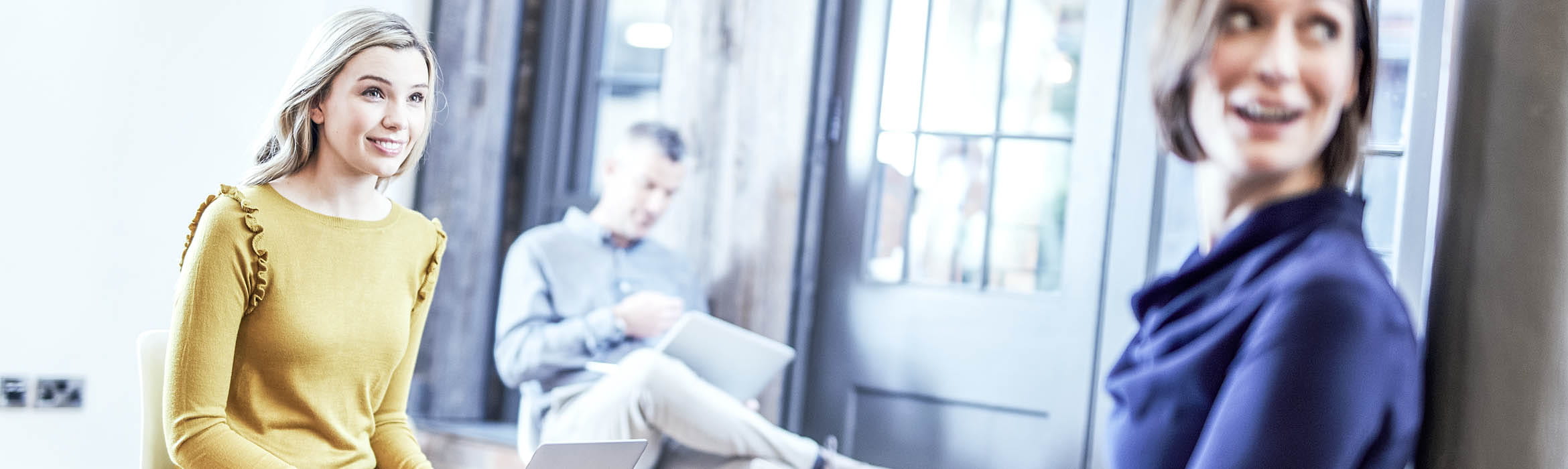 two women in an office environment