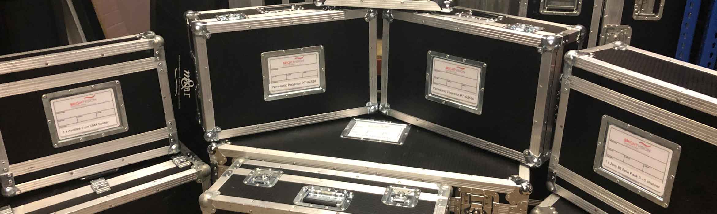 Stacked flight cases showing brand and content labelling