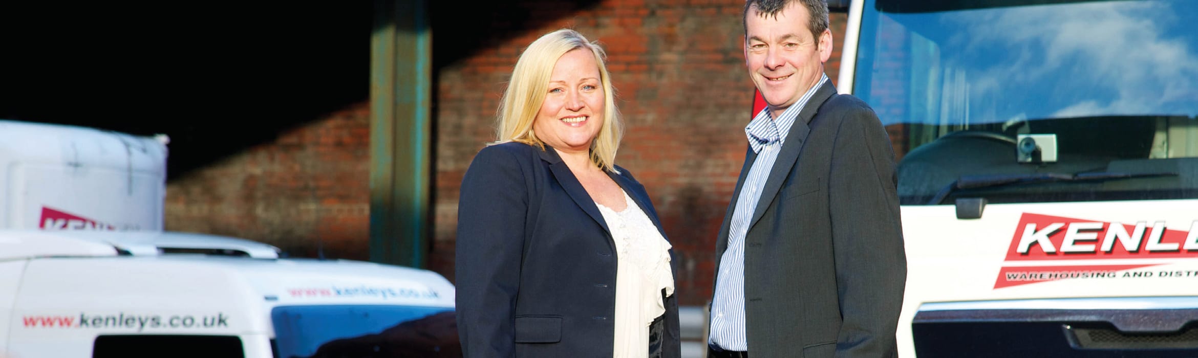 Lesley Walker and Campbell Elliott standing in front of a white Kenley delivery vehicle