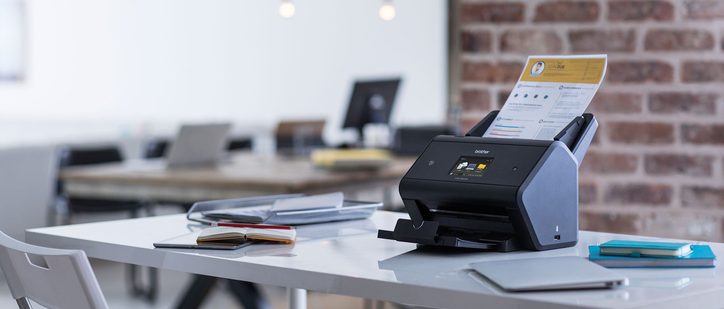 ADS-3600W scanner in a busy office with output