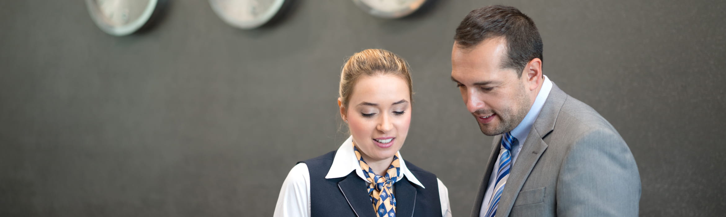 Two colleagues at a hotel reception