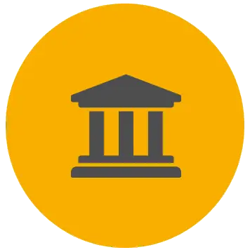 Grey building in a amber circle