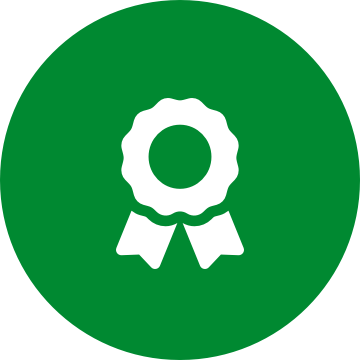 White award icon on a round green background