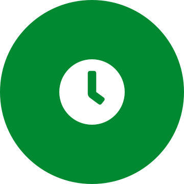 White clock icon on a round green background