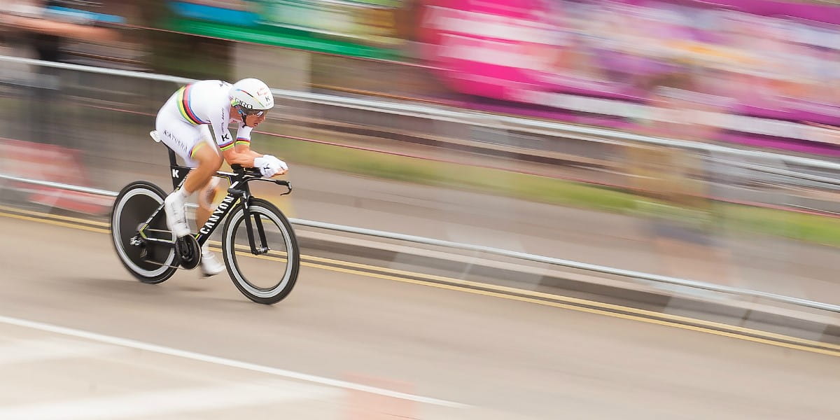 cyclist finishing a race beside the seaside
