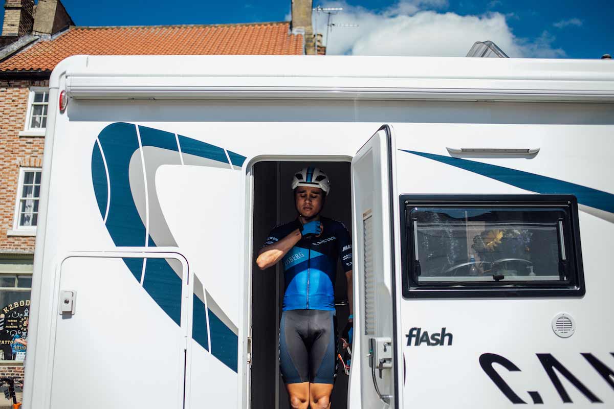 Max Steadman stood in a camper van