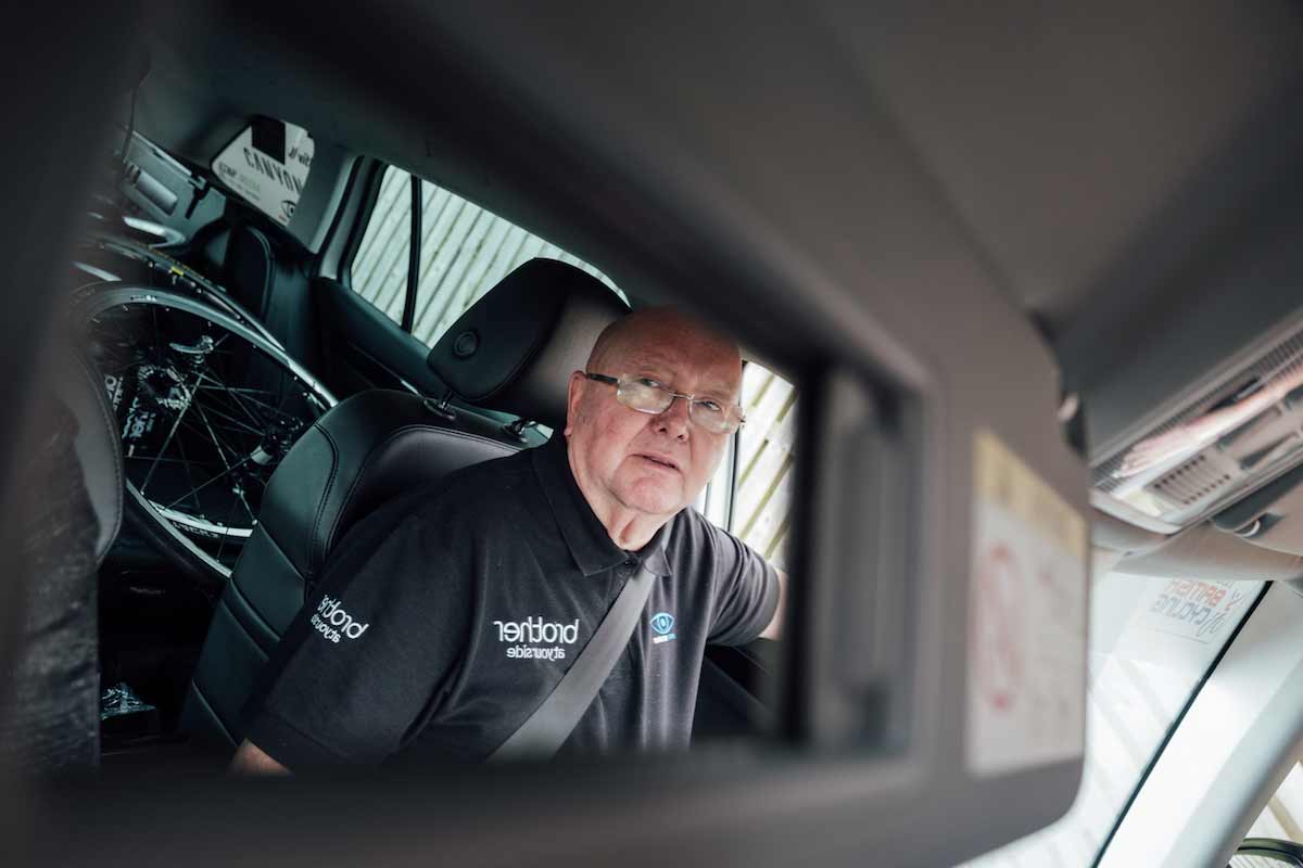 Dean Hardy driving a van
