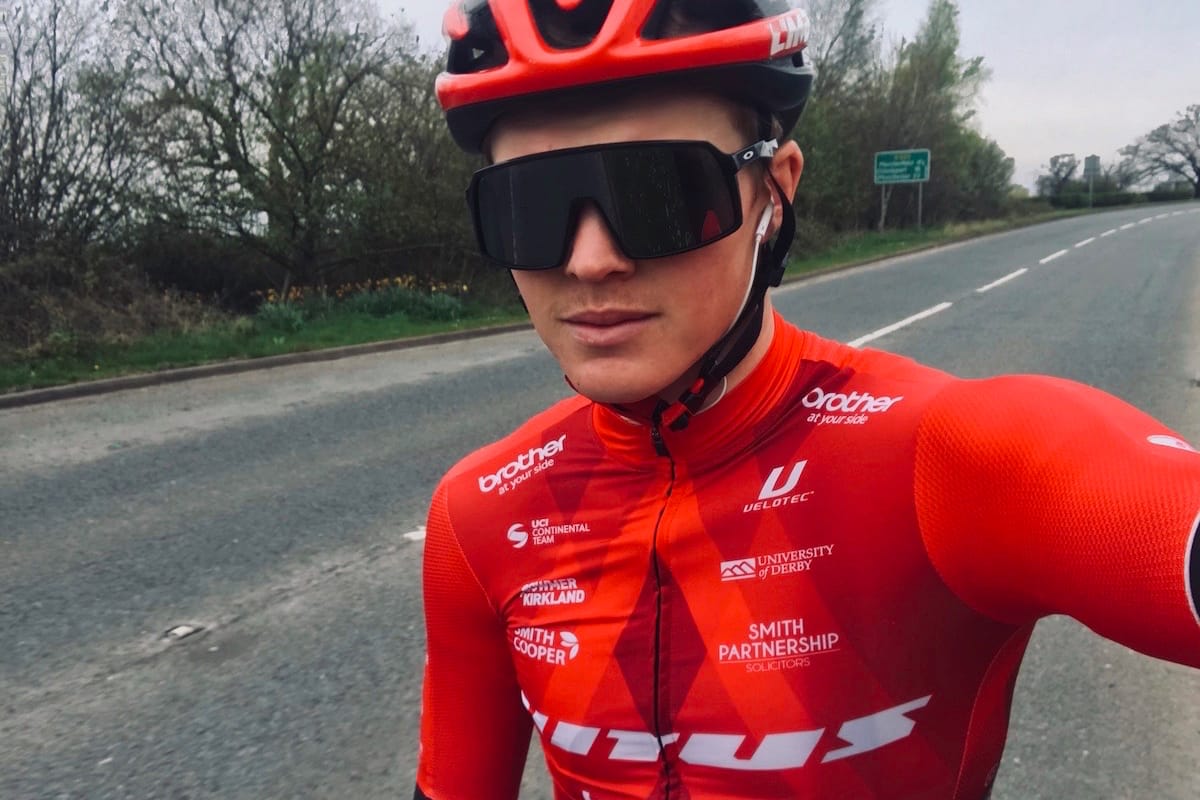 Cyclist Tom Mazzone taking a selfie at the side of an empty road
