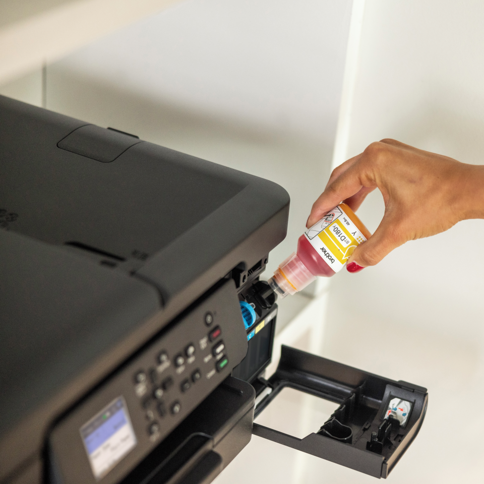 <p>BTD180Y yellow ink bottle filling printer</p>
