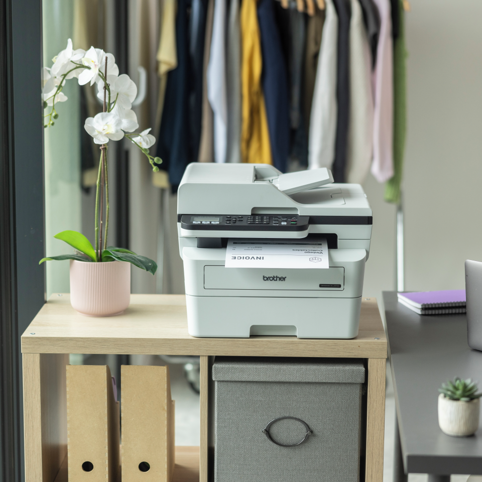 <p>MFCB7810DW facing forward in a home office environment with mono duplex output</p>