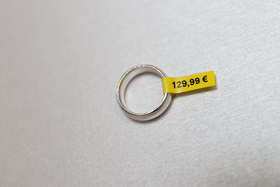Brother TZe-FX611 flexible-ID tape cassette - black on yellow - price label around ring/jewellery 