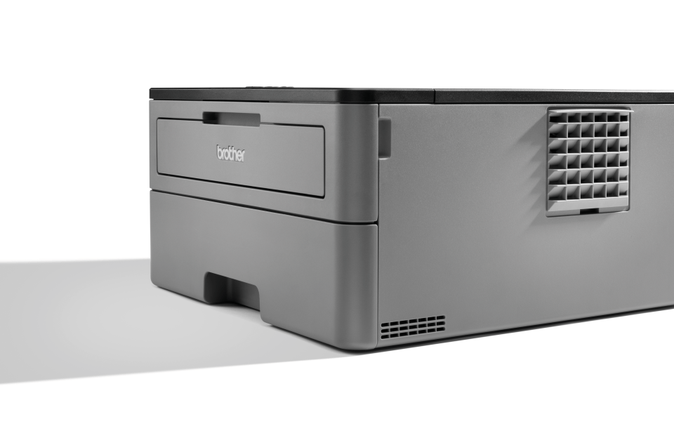 Compact mono laser printer facing left with shadow
