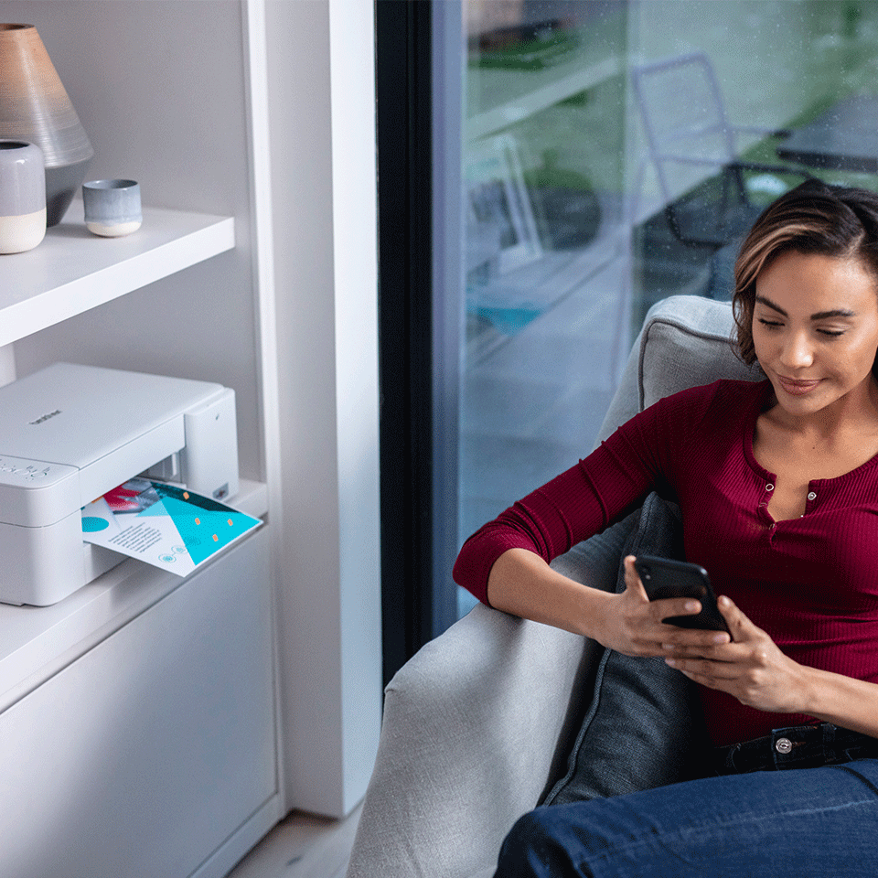 Lady on her phone at home next to the DCPJ1200W