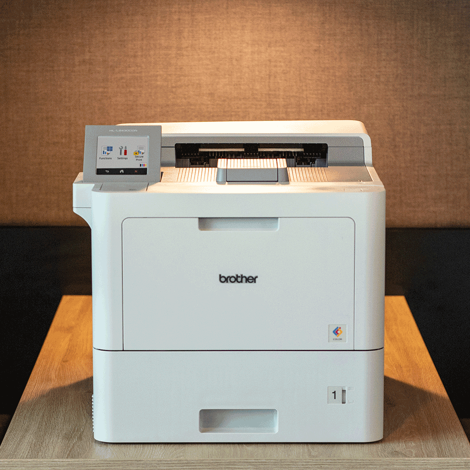 HL-L9430CDN printer on a table, light