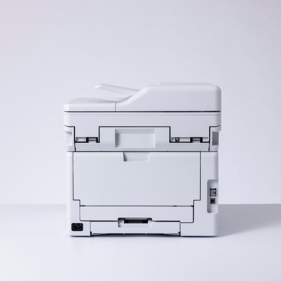 Brother DCP-L3555CDW 3-in-1 LED printer facing back on a white background