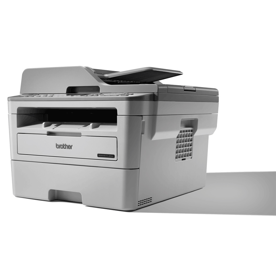 Brother 4-in-1 mono laser MFC-B7715DW printer facing left with shadow