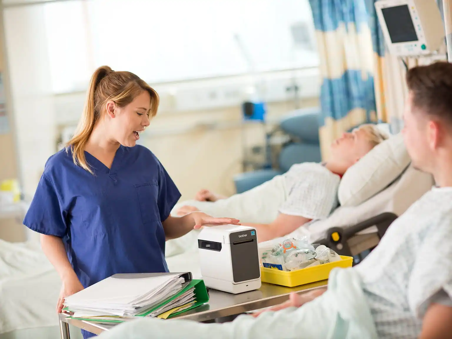 Nurse with TD-2000 on cart