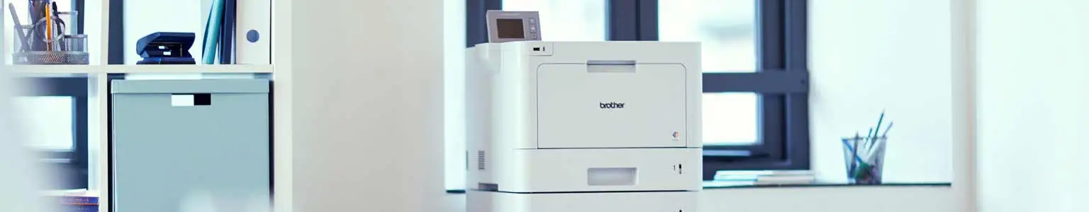 Brother Colour laser printer in the background of an office